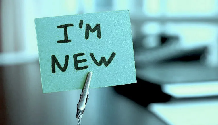 Postit on a clip with "I'm New" written on it
